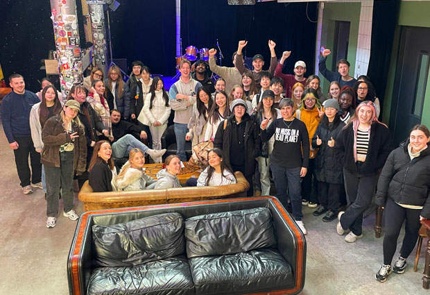 A group photo of students on a trip to Amsterdam