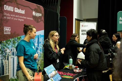 Students talking to DMU staff about global opportunities